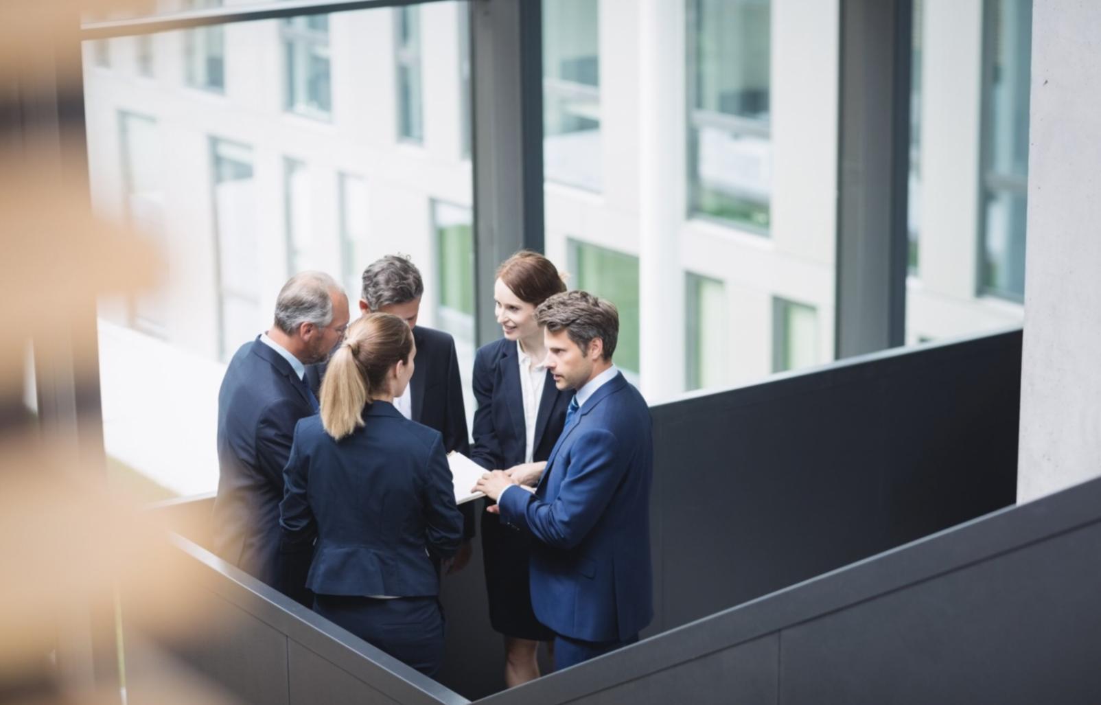 Professional business meeting discussing personnel management strategies